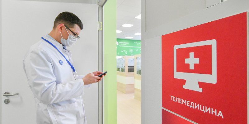 Telemedicine centre doctors assist COVID-19 patients